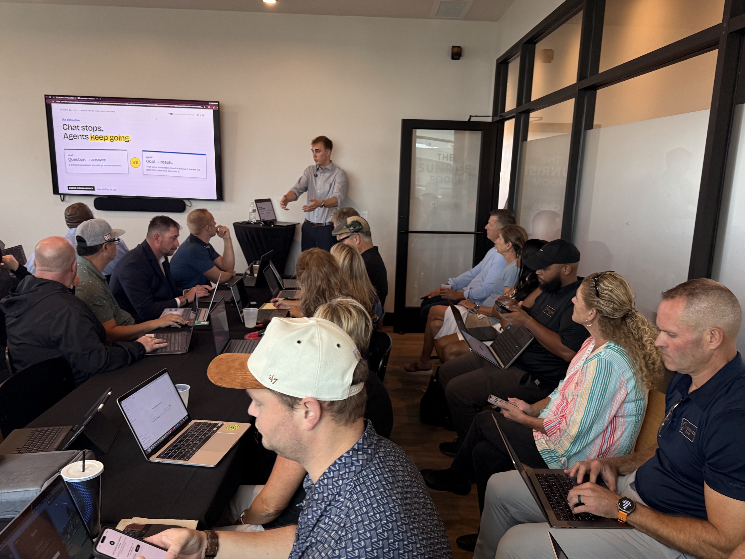 Thomas teaching a hands-on AI workshop.